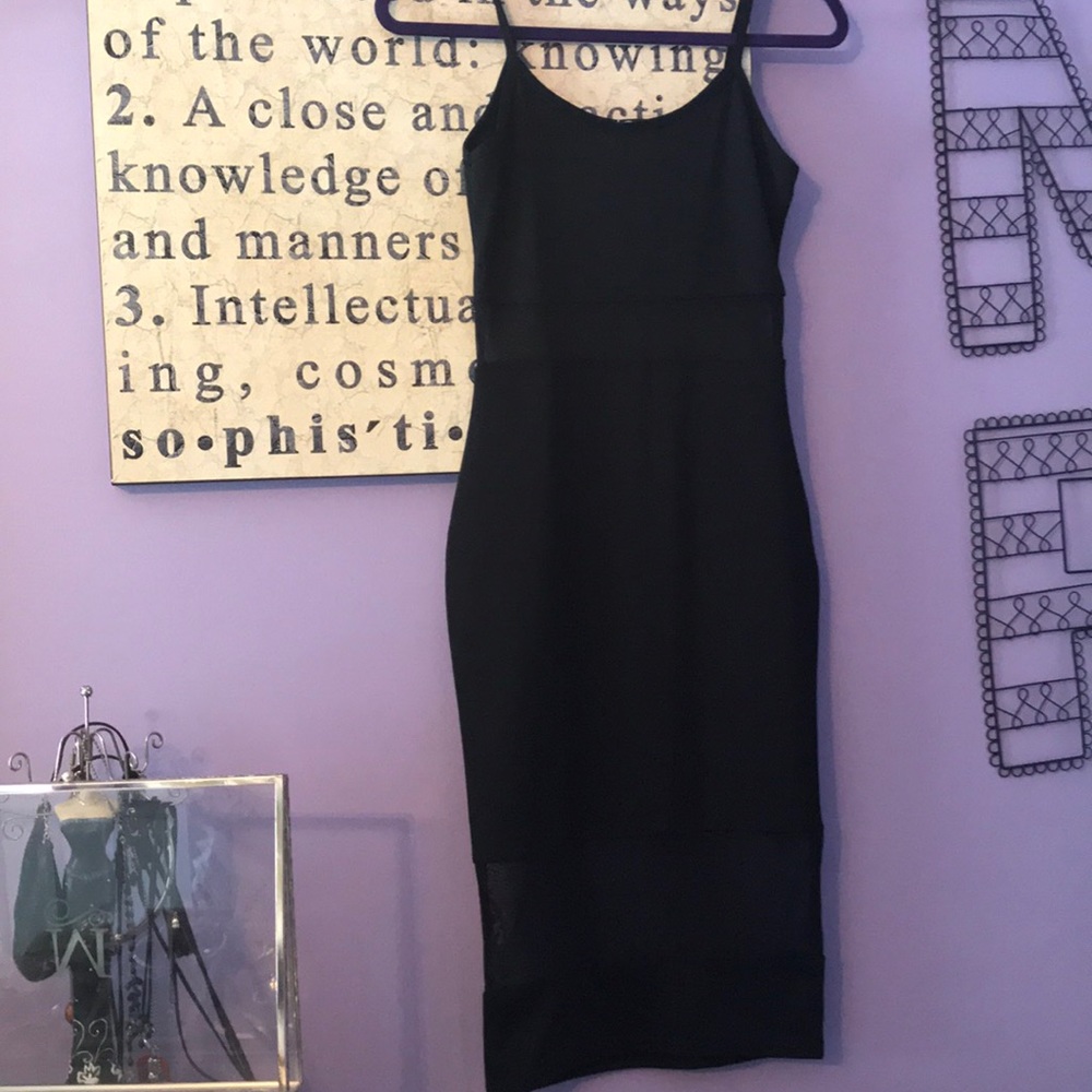 Brand new Black fitted dress with shear